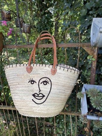 Panier en paille visage femme 