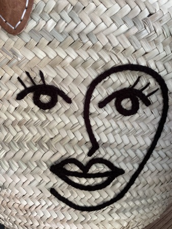 Panier en paille visage femme 